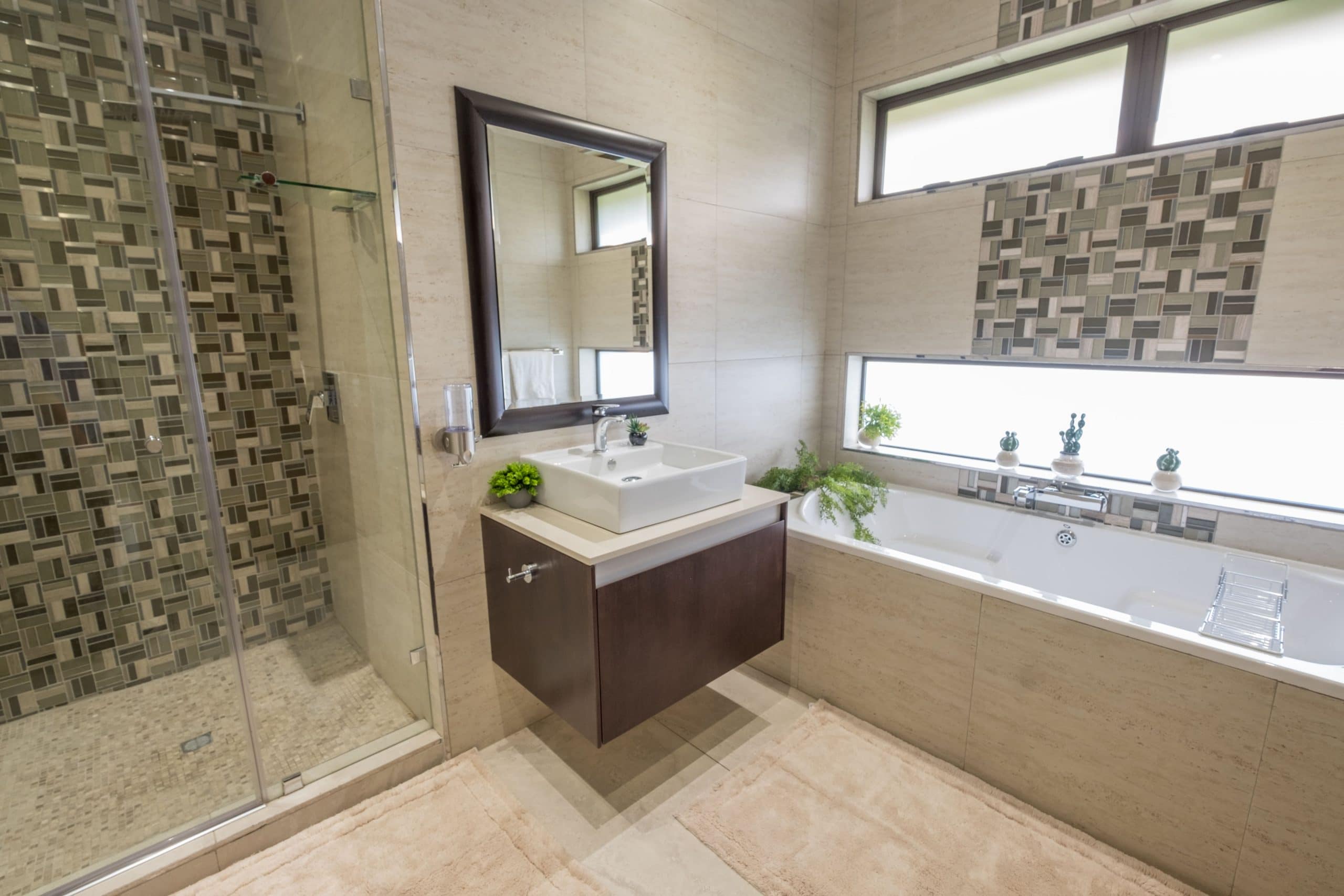Minimalistic earth-toned bathroom bathed in soft light